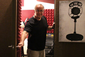 Johnny in voice recording studio.